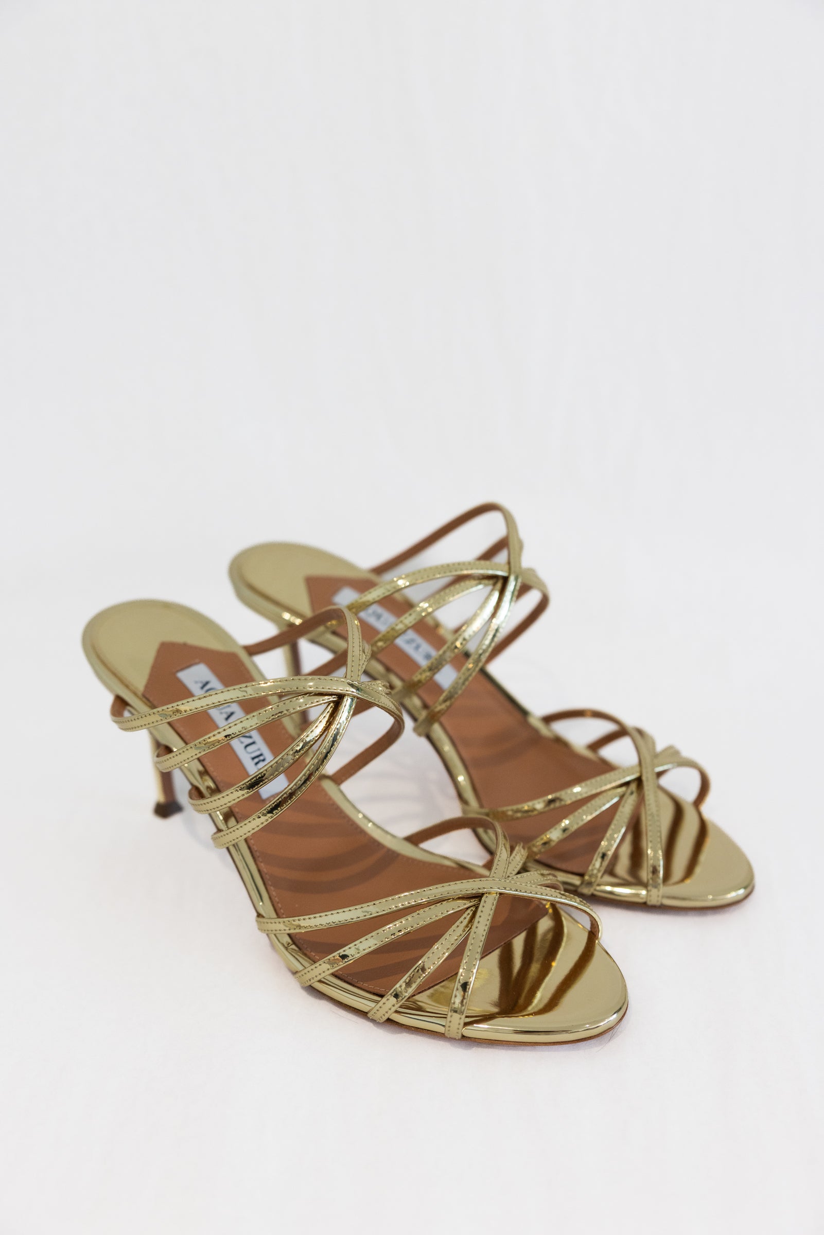 AQUAZZURA TELL ME MIRRORED LEATHER SANDALS MULE 75MM - GOLD